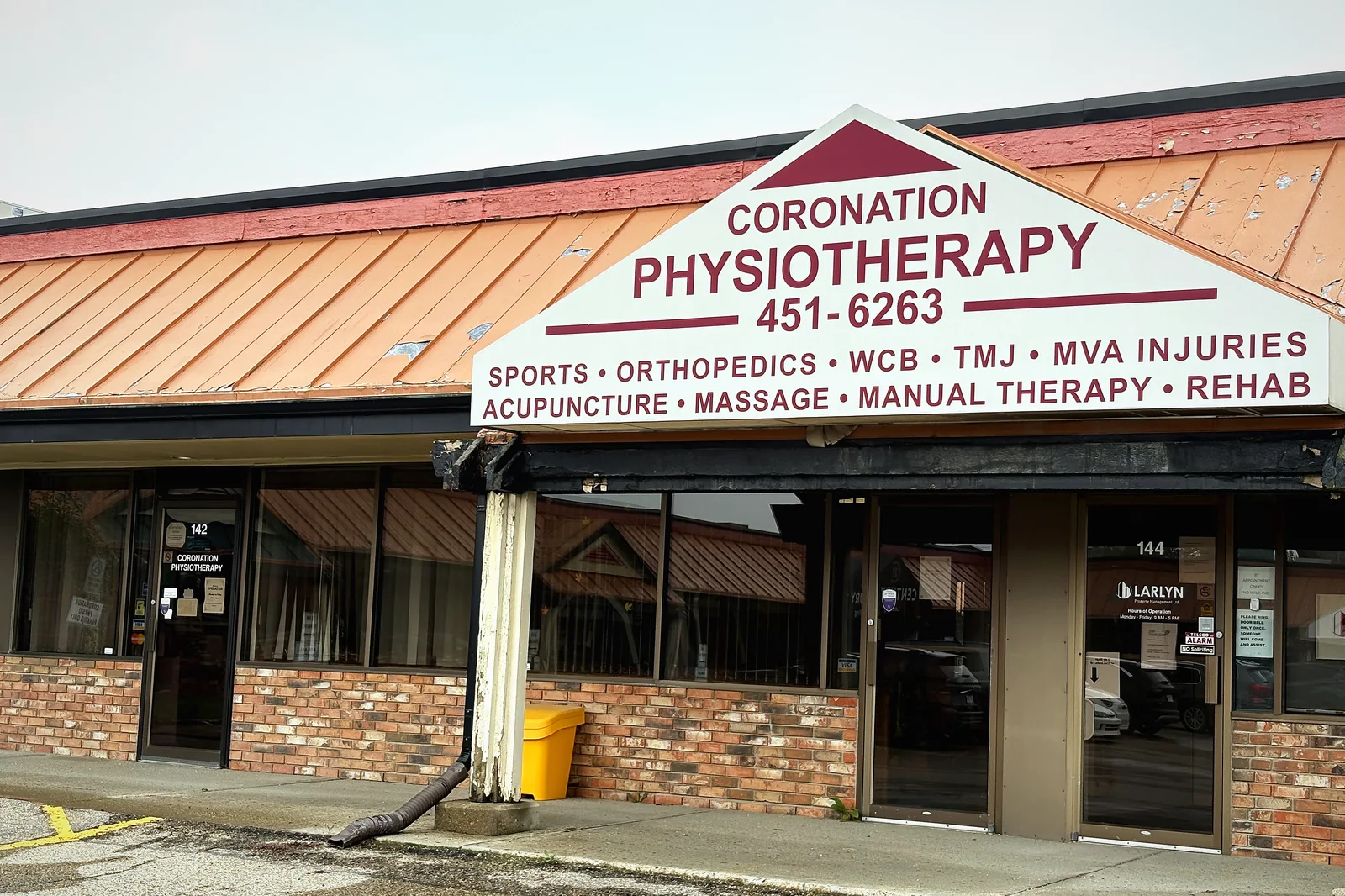 The Coronation Physiotherapy signage on the building frontage at 118 Avenue